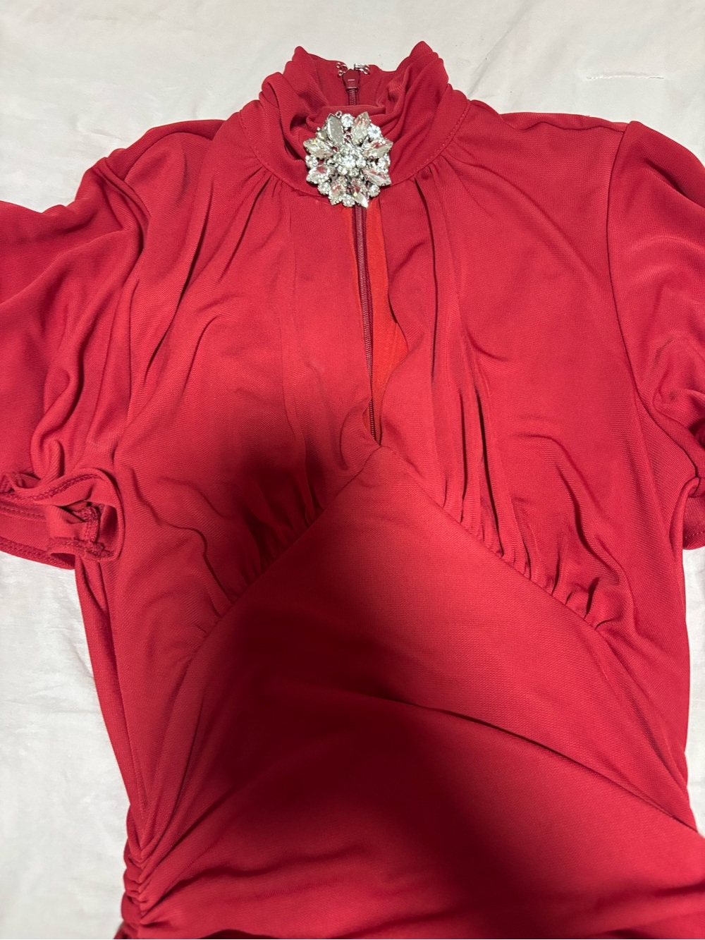 cinq a sept Red Mock Neck Top with Jeweled Brooch